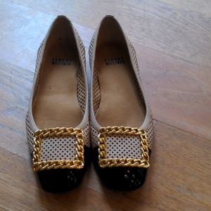 Stuart Weitzman beige flats with gold buckle